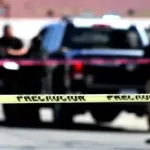 Cinta de precaución y patrulla en una escena vinculada a violencia política