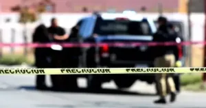 Cinta de precaución y patrulla en una escena vinculada a violencia política